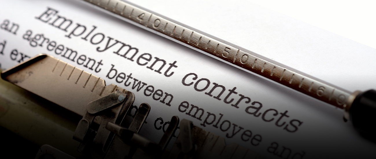 Close-up of employment contracts
